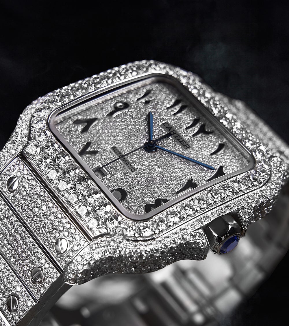 Image of a Cartier Santos Large, fully custom diamond-set with a diamond-paved dial featuring black Arabic numerals, crafted by Cagau.