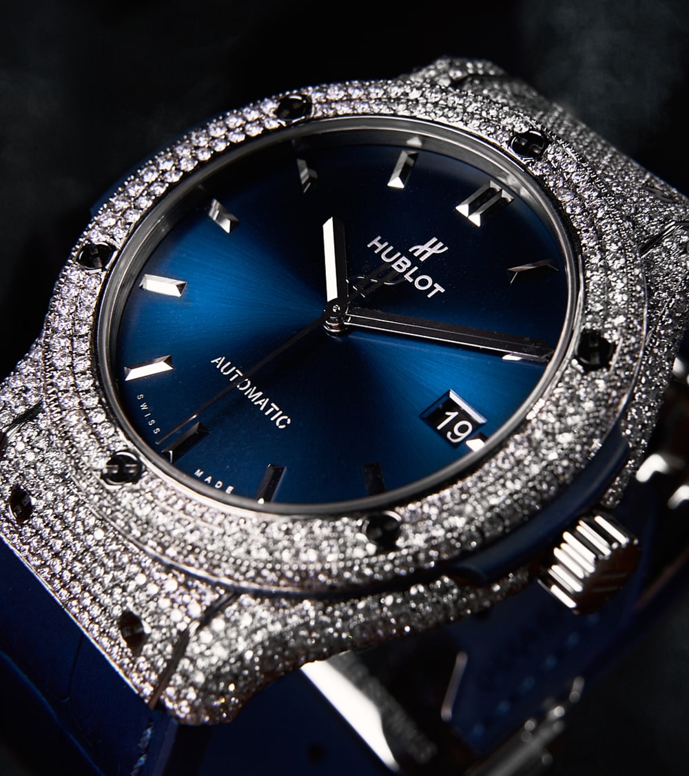 Image of a Hublot Classic Fusion 45 mm watch in titanium blue, custom-set with diamonds by Cagau.