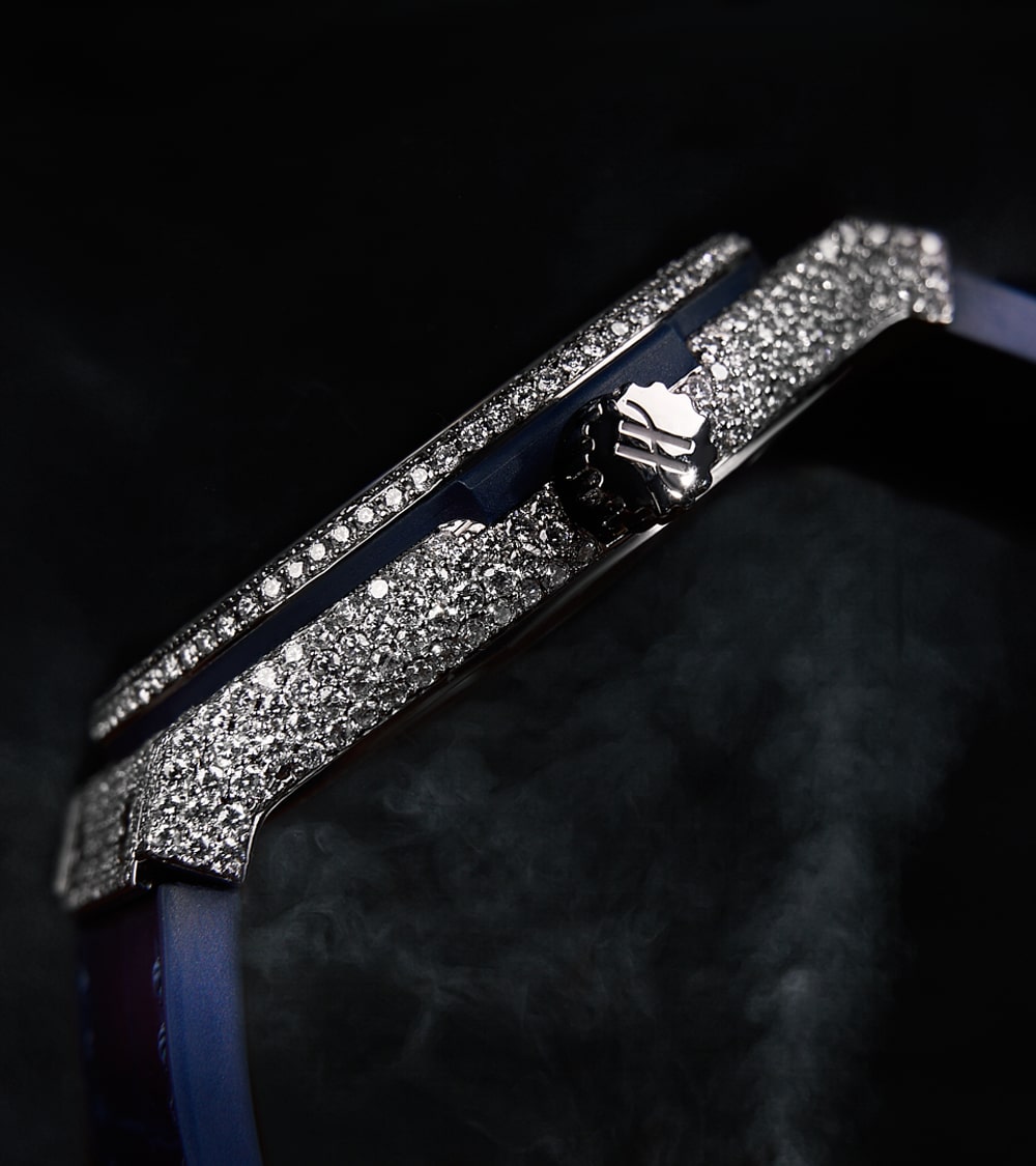 Image of a Hublot Classic Fusion 45 mm watch in titanium blue, custom-set with diamonds by Cagau.