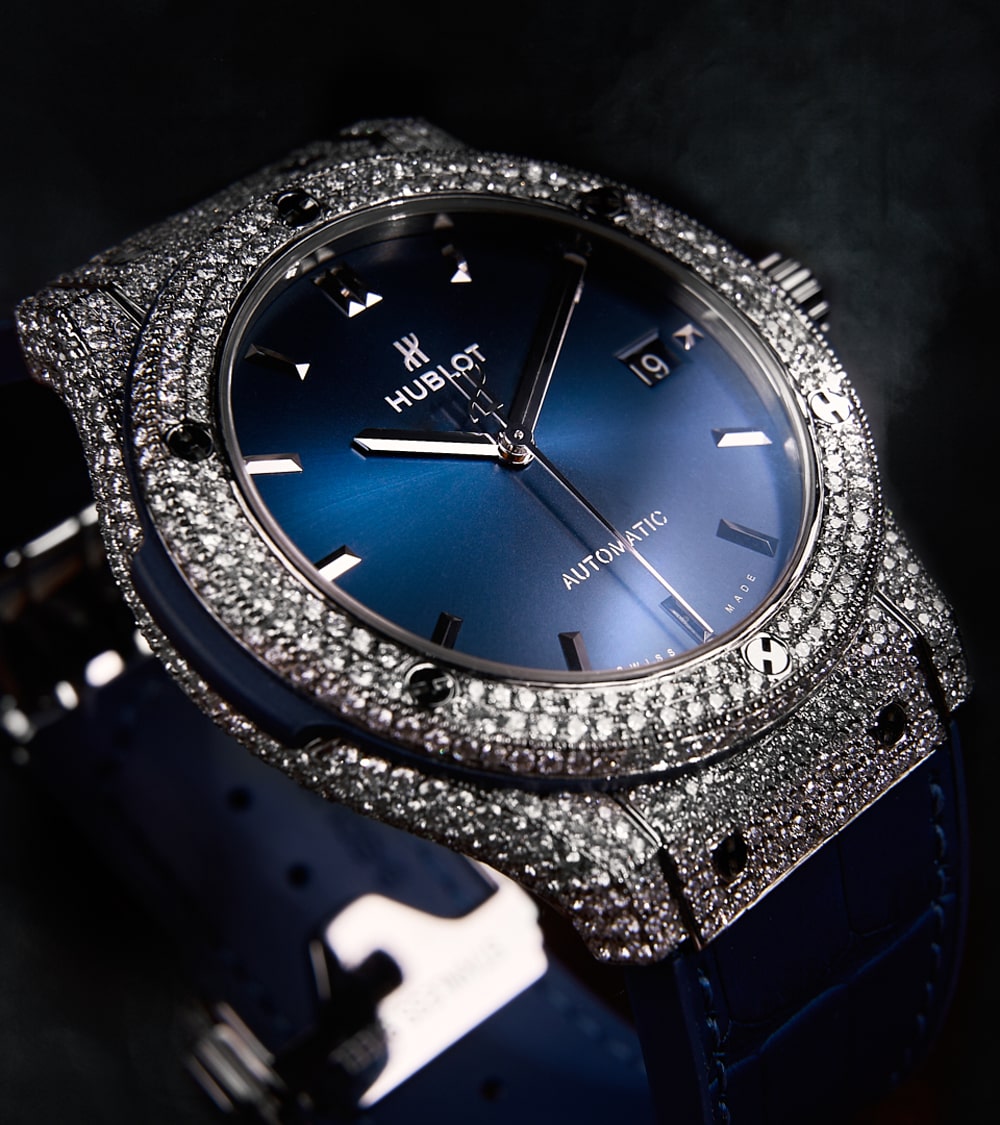 Image of a Hublot Classic Fusion 45 mm watch in titanium blue, custom-set with diamonds by Cagau.