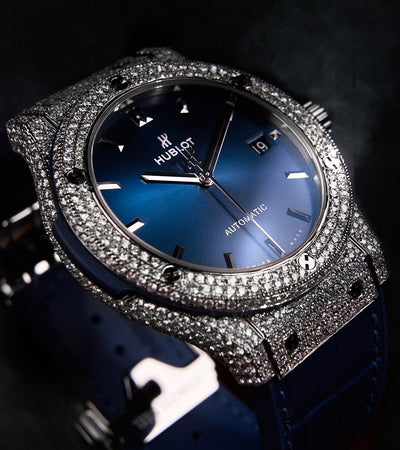 Image of a Hublot Classic Fusion 45 mm watch in titanium blue, custom-set with diamonds by Cagau.