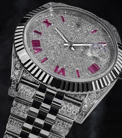 Image of a Rolex Datejust 41 with a custom diamond-set case and bracelet, featuring a dial with ruby-colored Roman numeral markers by Cagau.