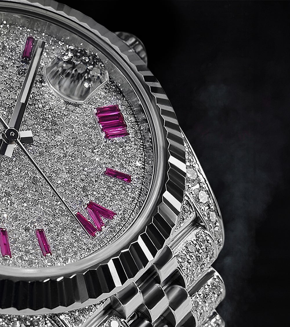 Image of a Rolex Datejust 41 with a custom diamond-set case and bracelet, featuring a dial with ruby-colored Roman numeral markers by Cagau.