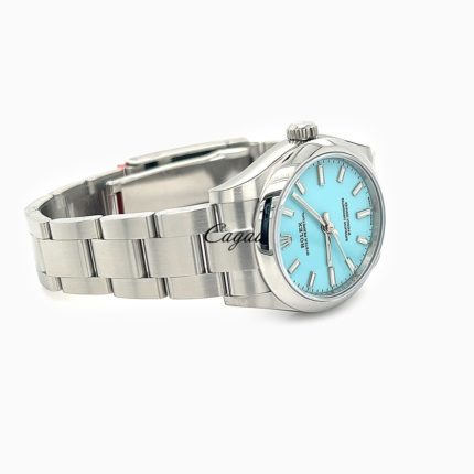 RX000148-Rolex–Oyster-Perpetual-31–Oystersteel–Oyster–Turquoise-Tiffany-Dial-7-min